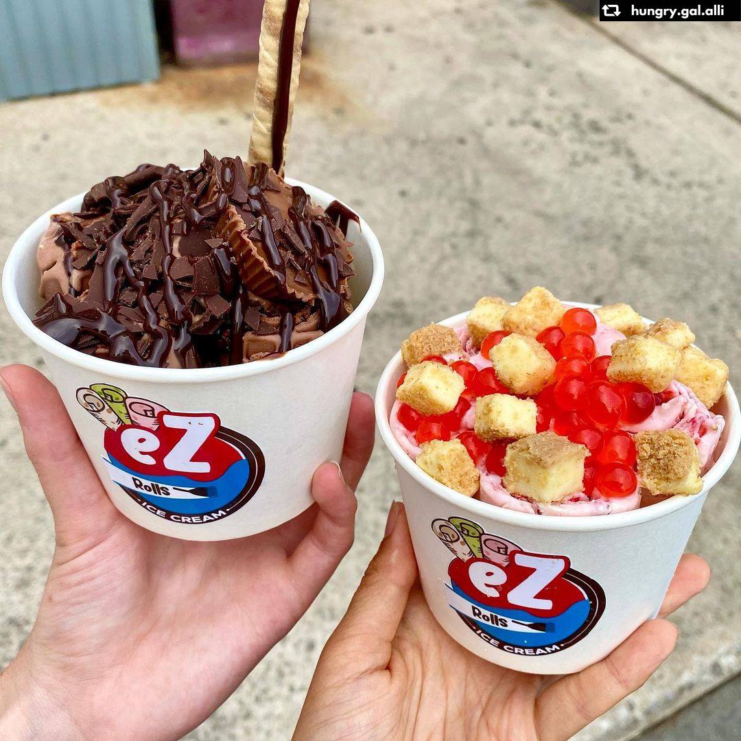 Two ice cream cups held together — chocolate with wafer and strawberry cheesecake